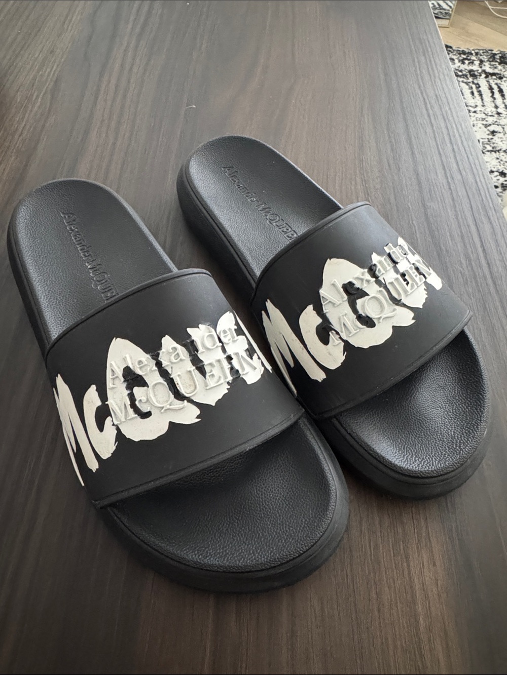Alexander McQueen Black Slides with White Graphic Logo